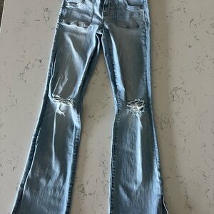 Women's Light Blue American eagle next level stretch Distressed Jeans - size 2